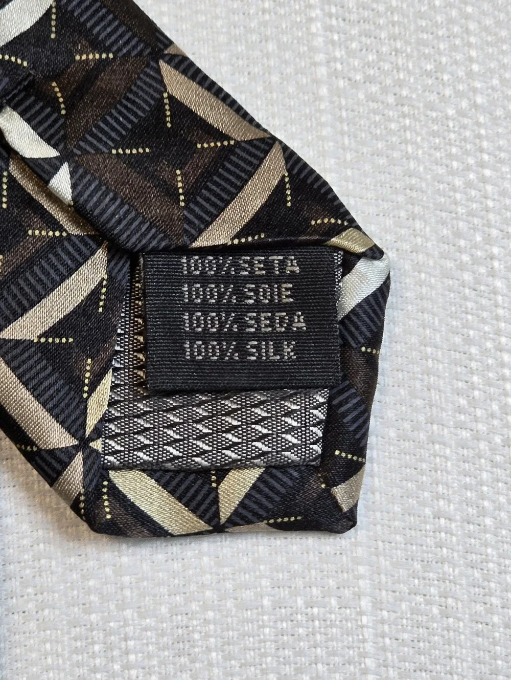 Covington Pure Silk Black Tie with Gold and Cream Geometric Motif